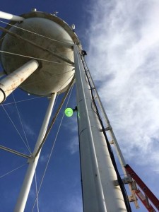 Technician Climbing Tower